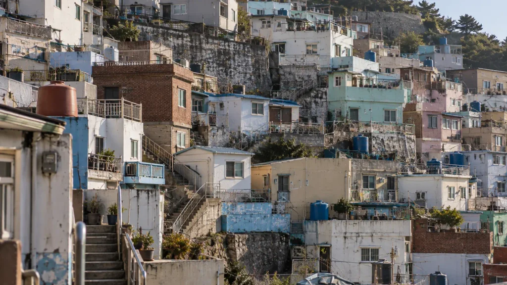 Tiered hillside homes and narrow stairways in Gamcheon Culture Village, Busan